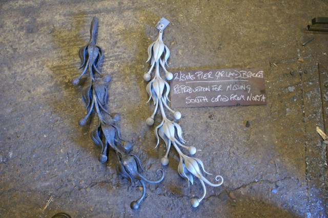 Garland reproduction for the South 2/3rds pier (self colour) the fixing location still needs to be sculpted on to the bar, the original on right and is in primer.